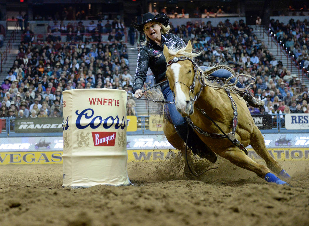 Ivy Conrado of Hudson, Colo. (107) competes in barrel racing during the sixth go-round of the National Finals Rodeo at the Thomas & Mack Center in Las Vegas, Tuesday, Dec. 11, 2018. Caroline B ...