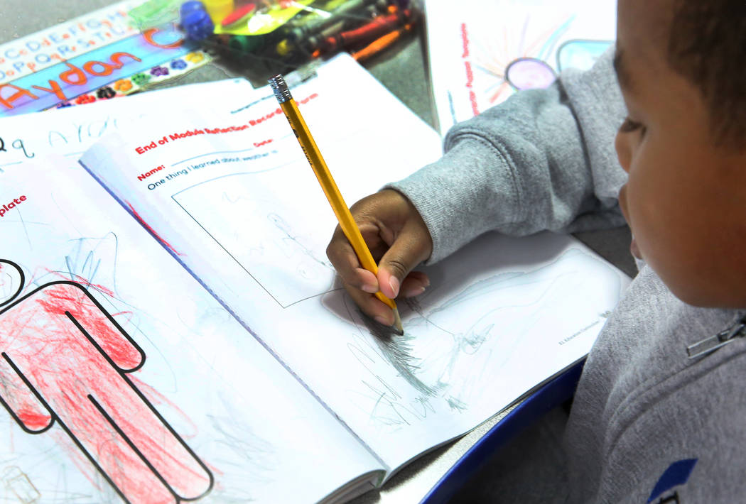 Kindergarten student Aydan Clare colors at Nevada Rise Academy on Tuesday, Dec. 11, 2018, in Las Vegas. Bizuayehu Tesfaye Las Vegas Review-Journal @bizutesfaye