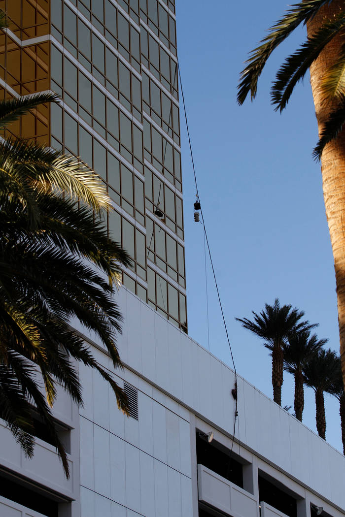 A wire from Trump International hotel is seen in Las Vegas, Wednesday, Dec. 12, 2018. A man washing windows outside the hotel fell to his death Wednesday afternoon. Chitose Suzuki Las Vegas Review ...