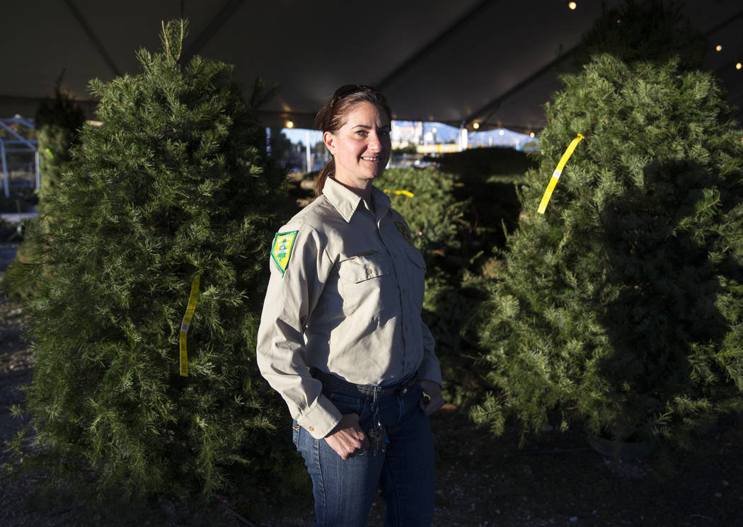Cayenne Engel, a general biologist for the Nevada Division of Forestry employee, poses during a ...