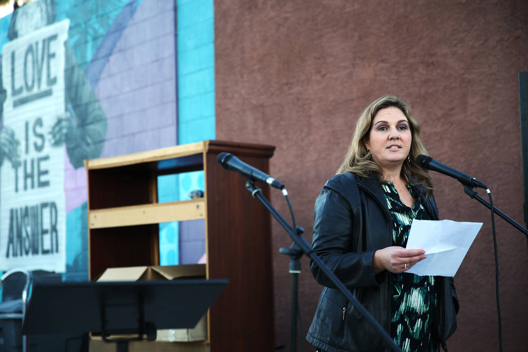 Melissa Clary, board member for the Southern Nevada Homeless Continuum of Care, speaks during the 23rd Annual Homeless Candlelight Vigil at the CARE Complex in Las Vegas, Thursday, Dec. 13, 2018. ...