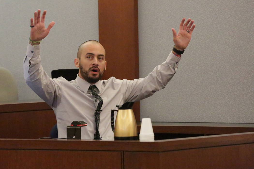 Jose Navarrete, one of two former Nevada Department of Corrections officers accused of using unnecessary force on an inmate, describes the incident to a jury on Friday, December 14, 2018. Michael ...