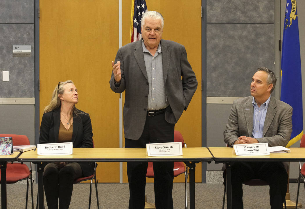 Gov.-elect Steve Sisolak is flanked by Culinary Health Fund's Bobbette Bond, left, and UMC's Mason Van Houwelling during a roundtable titled "A Healthy Nevada for All." at the National A ...