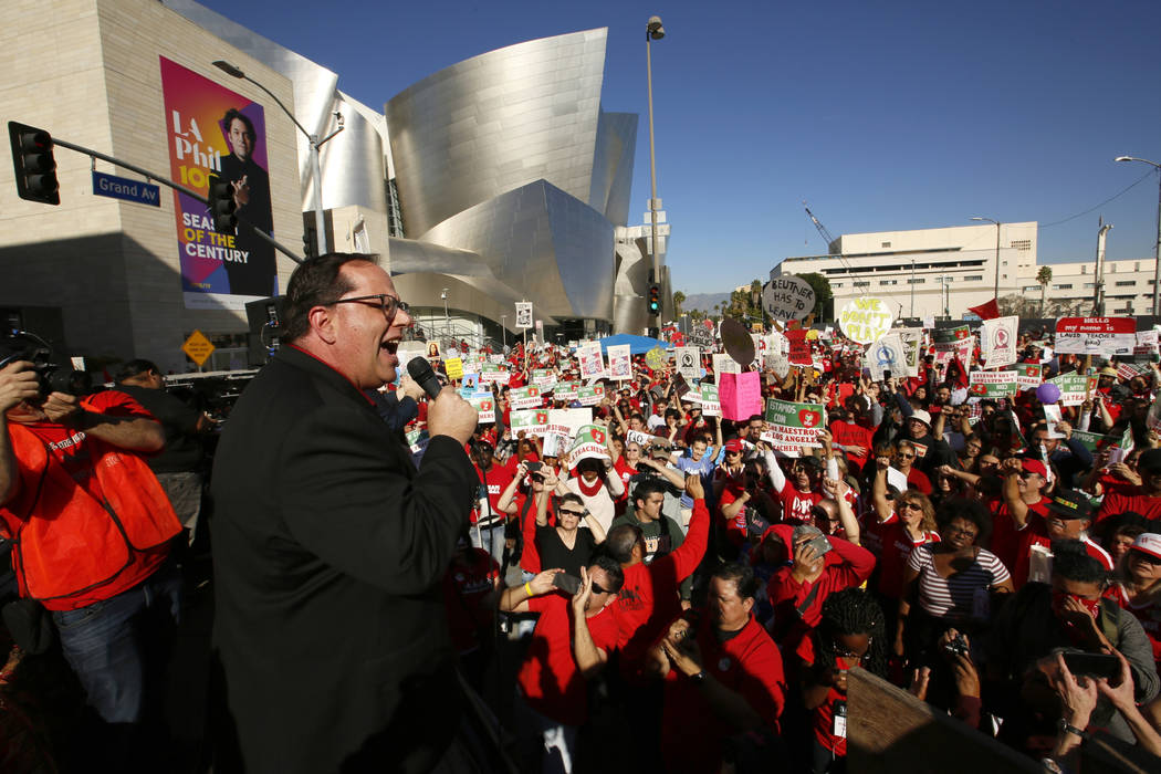 United Teachers Los Angeles president Alex Caputo-Pearl addresses thousands of teachers, who may go on strike against the nation's second-largest school district next month, as they rally next to ...