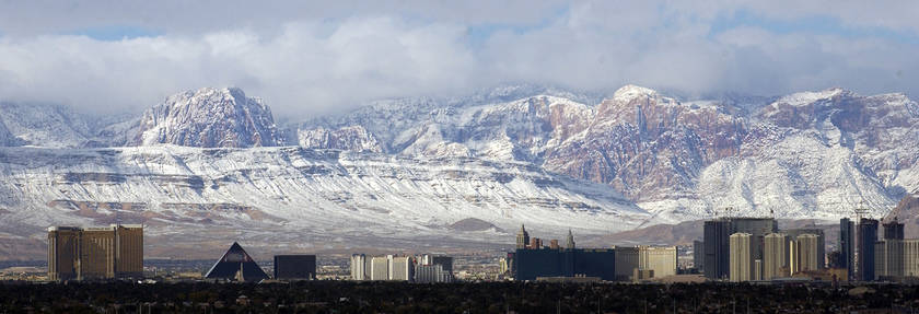 The Las Vegas Strip is seen with the snow-covered Spring Mountains on Dec. 16, 2008. (Las Vegas Review-Journal)