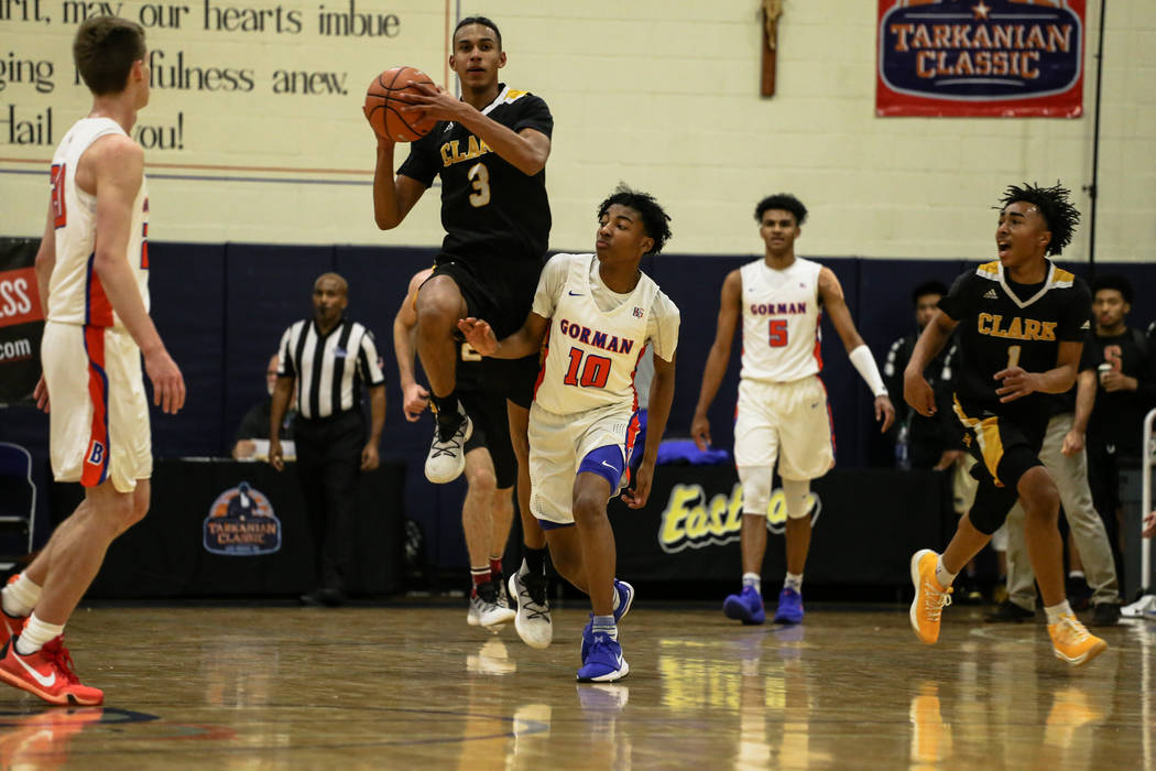 Clark Chargers' Greg Foster Jr (3) shoots the ball during the final seconds of the first half of the platinum division championship basketball game of the Tarkanian Classic against Bishop Gorman a ...