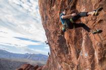 Alex Honnold descends The Gallery at Red Rock Canyon on Monday, Dec. 17, 2018, in Las Vegas. Ho ...