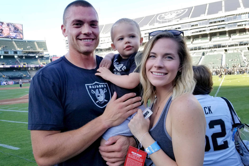 Raiders tight end Derek Carrier and wife Dora Carrier pose with son Dominic before an exhibition game against the Green Bay Packers at the Oakland-Alameda County Coliseum on Aug. 24, 2018. (Courte ...