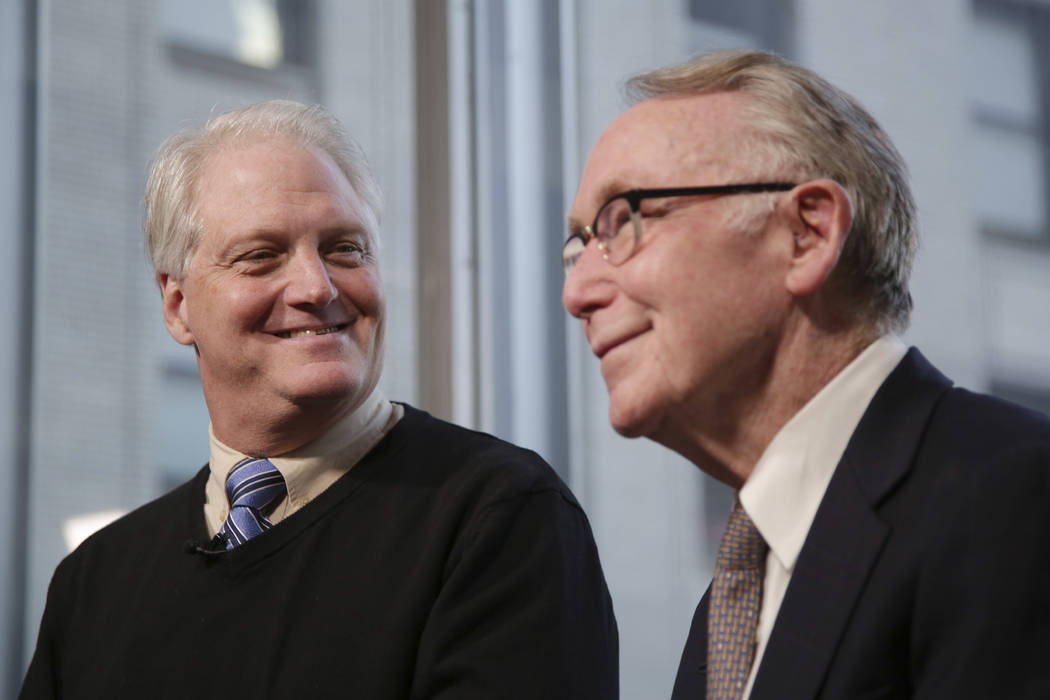 In this Dec. 19, 2018 photo, Craig Antico, left, and Jerry Ashton, co-founders of RIP Medical Debt, talks to reporters in New York. The co-founders of RIP Medical Debt buy millions of dollars in p ...
