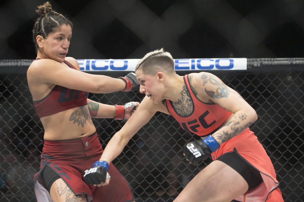 Macy Chiasson, right, lands a right hook on Pannie Kianzad during the first round of “The Ultimate Fighter” Season 28 Finale on Friday, Nov. 30, 2018, at The Pearl, at Palms, in Las ...