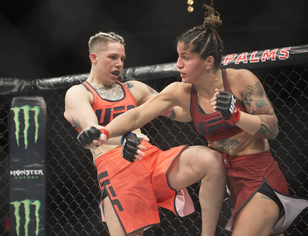 Macy Chiasson, left, lands a kick against Pannie Kianzad during the first round of “The Ultimate Fighter” Season 28 Finale on Friday, Nov. 30, 2018, at The Pearl, at Palms, in Las ...