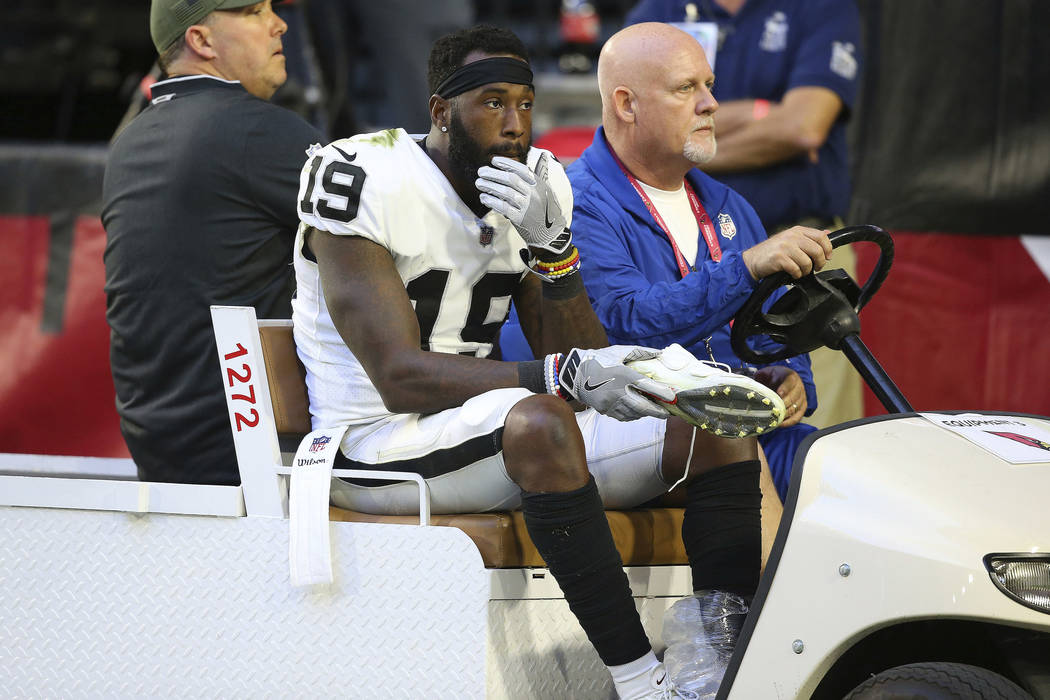 Oakland Raiders wide receiver Brandon LaFell (19) is carted off the field after an injury against the Arizona Cardinals during the second half of an NFL football game, Sunday, Nov. 18, 2018, in Gl ...