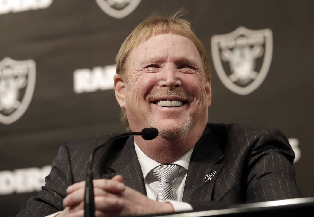 Oakland Raiders owner Mark Davis smiles at at a news conference introducing Mike Mayock as the team's general manager at the team's headquarters in Oakland, Calif., Monday, Dec. 31, 2018. (AP Phot ...