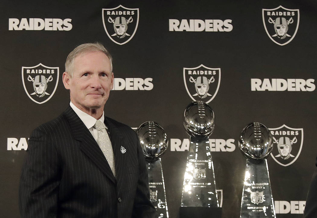 Mike Mayock arrives at a news conference announcing him as the new Oakland Raiders general manager at the team's headquarters in Oakland, Calif., Monday, Dec. 31, 2018. (AP Photo/Jeff Chiu)