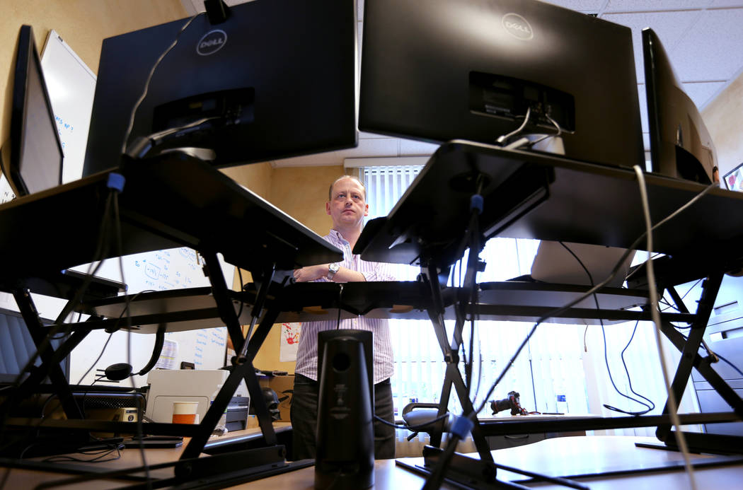 Don Best Sports Trading Director Craig Mucklow does in-game trading for the Los Angeles-Minnesota NFL game at his Las Vegas office Thursday, Sept. 27, 2018. K.M. Cannon Las Vegas Review-Journal @K ...
