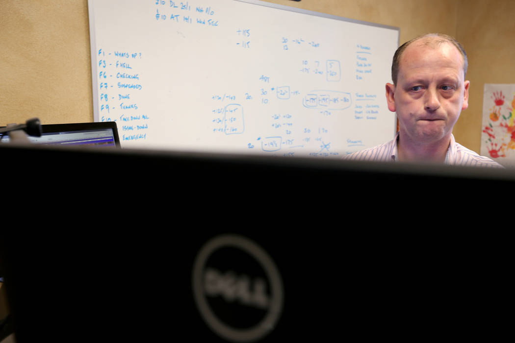 Don Best Sports Trading Director Craig Mucklow does in-game trading for the Los Angeles-Minnesota NFL game at his Las Vegas office Thursday, Sept. 27, 2018. K.M. Cannon Las Vegas Review-Journal @K ...