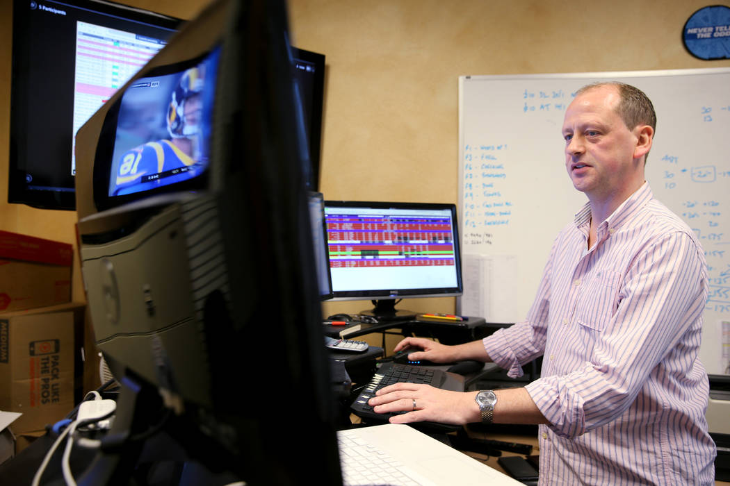 Don Best Sports Trading Director Craig Mucklow does in-game trading for the Los Angeles-Minnesota NFL game at his Las Vegas office Thursday, Sept. 27, 2018. K.M. Cannon Las Vegas Review-Journal @K ...