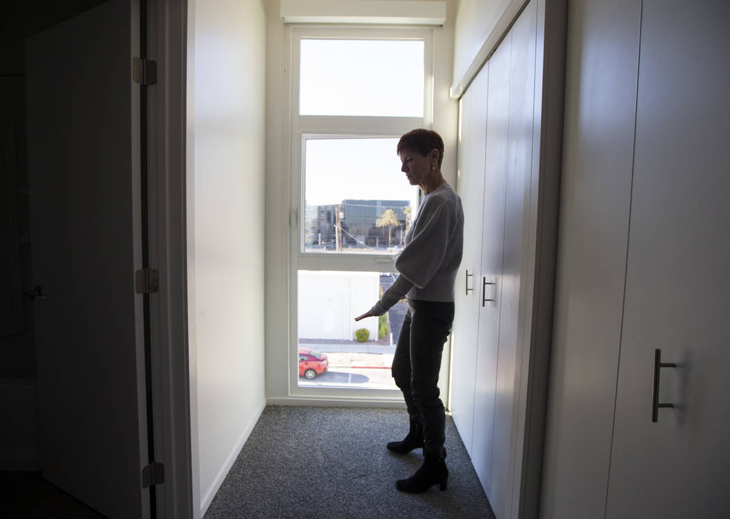 Beverly Rogers walks through a residential unit at The Lucy, a multipurpose creative residency created by Rogers that will also be the home to the Writers Block bookstore, in downtown Las Vegas on ...