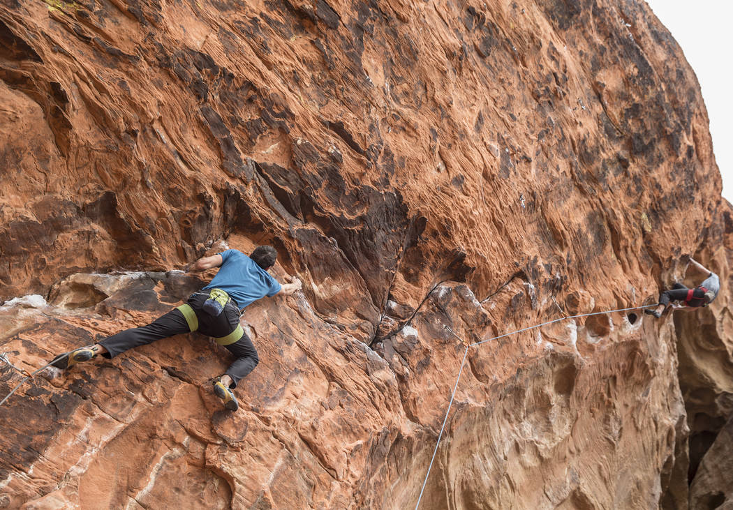 Alex Honnold ascends The Gallery at Red Rock Canyon on Monday, Dec. 17, 2018, in Las Vegas. Honnold, arguably the best rock climber in the world, solo climbed El Capitan, a 3,000-foot granite wall ...