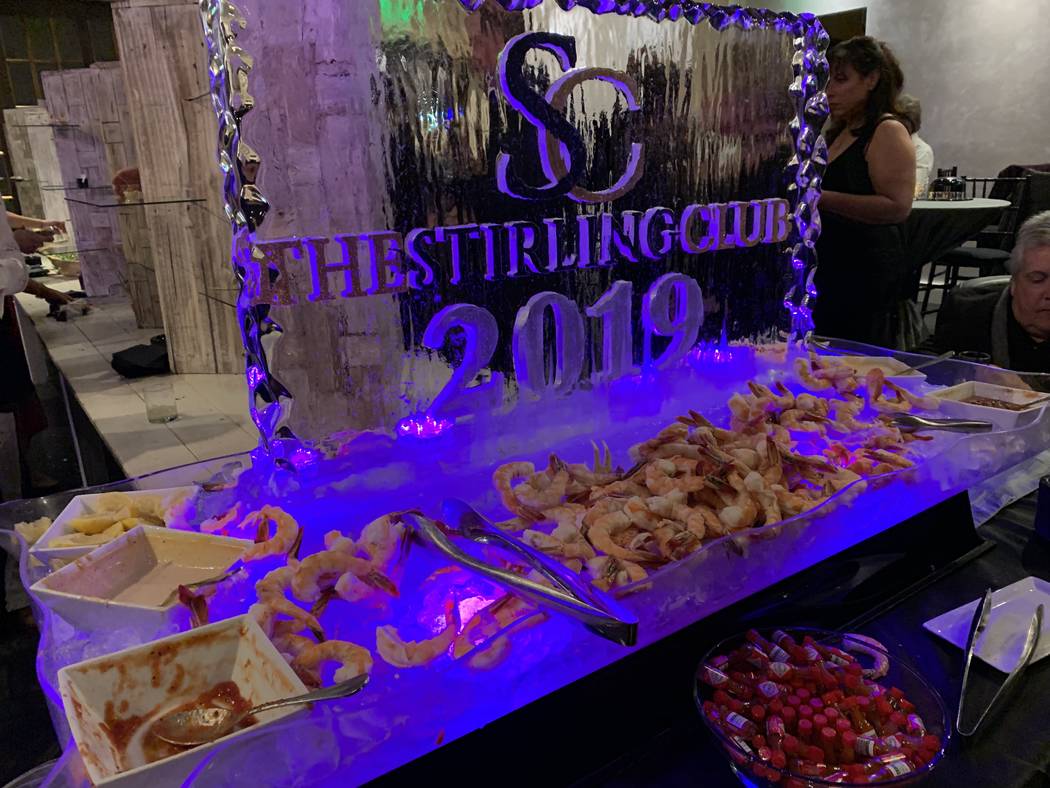Shrimp and an ice sculpture are shown at the re-opening party at Stirling Club at Turnbery Place on Dec. 31, 2018. (Mat Luschek/Las Vegas Review-Journal)