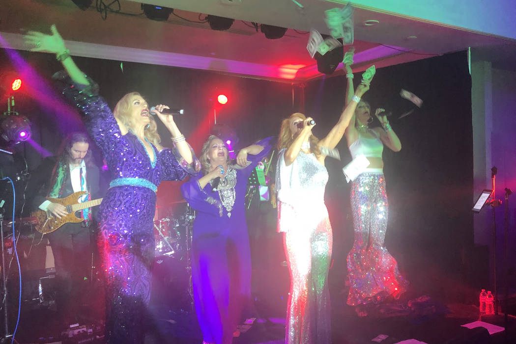 The ABBA-styled act featuring Kelly Clinton-Holmes, Kirbi Long, Ashley Fuller and Elisa Fiorillo is shown shown at the Stirling Club's re-opening party at Turnberry Place on Dec. 31, 2018. (John ...