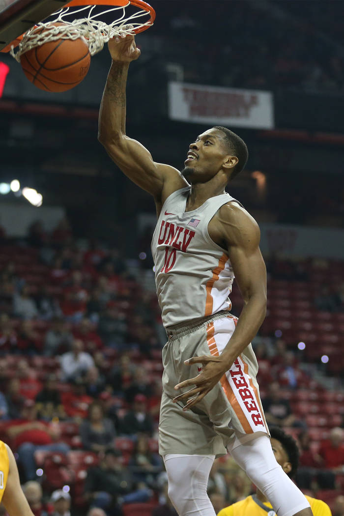 UNLV Rebels forward Shakur Juiston (10) dunks the ball for a score against Valparaiso Crusaders during the first half of the basketball game at the Thomas & Mack Center in Las Vegas, Wednesday ...