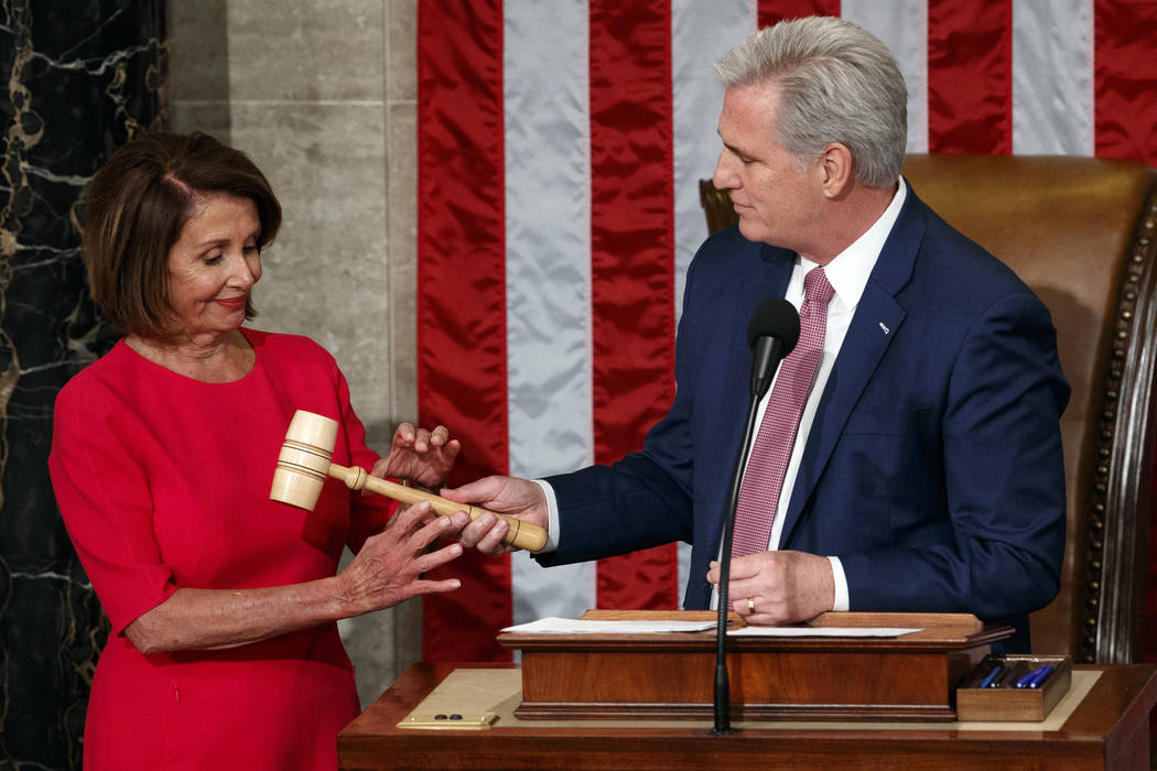 Nancy Pelosi of California takes the gavel from House Minority Leader Kevin McCarthy, R-Calif., after being elected House speaker at the Capitol in Washington, Thursday, Jan. 3, 2019. (AP Photo/C ...