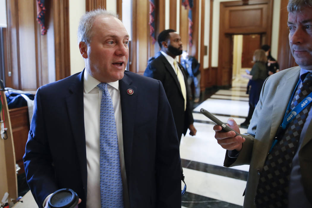 House Majority Whip Steve Scalise, R-La., left, talks with a reporter before a meeting on Capitol Hill, Thursday, Jan. 3, 2019 in Washington. (AP Photo/Alex Brandon)