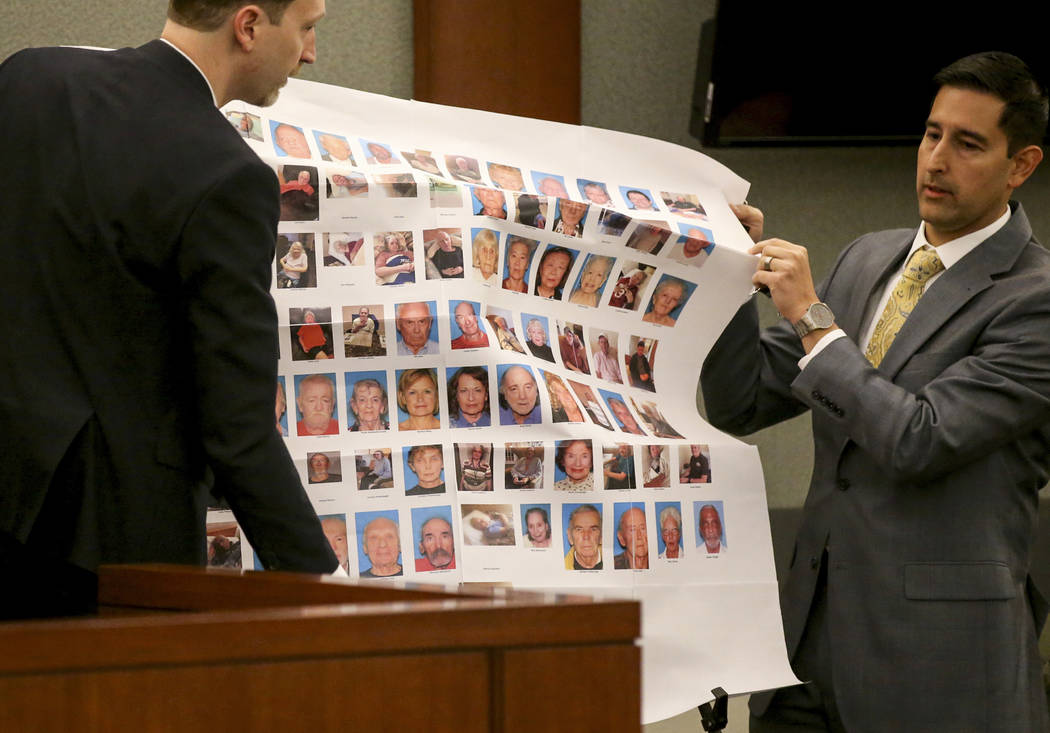 Senior Deputy Attorney General Daniel Westmeyer, left, and Chief Deputy District Attorney set up a display before sentencing for former Nevada guardian April Parks at the Regional Justice Center i ...
