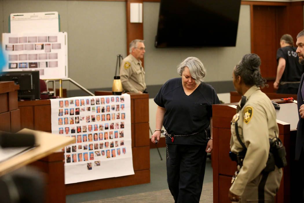 Former Nevada guardian April Parks is escorted out of the courtroom during a break in her sentencing at the Regional Justice Center in Las Vegas Friday, Jan. 4, 2019, after pleading guilty to expl ...