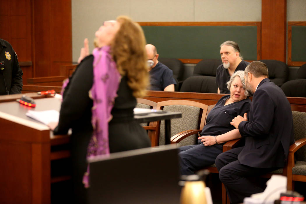 Former Nevada guardian April Parks talks to her attorney Anthony Goldstein as Elizabeth Indig gives a victim statement during Parks' sentencing at the Regional Justice Center in Las Vegas Friday, ...