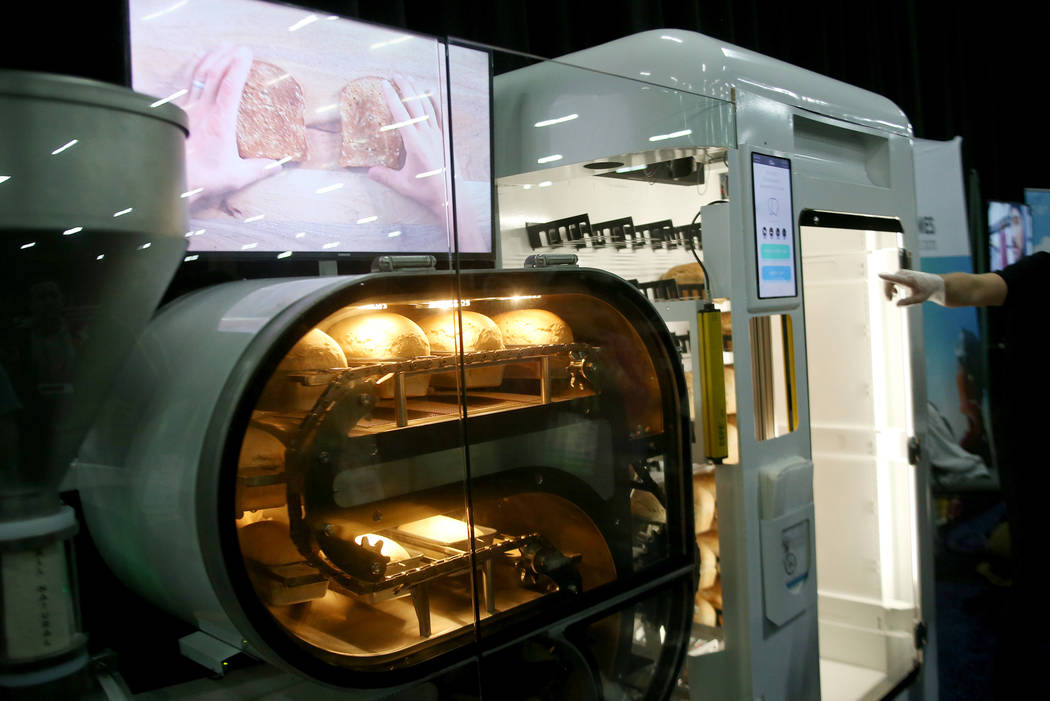 A fully automated bread machine called the Bread Bot, that creates bread from dough to baked loaf, on display at the CES Unveiled event for media prefacing the tech mega-conference at Mandalay Bay ...