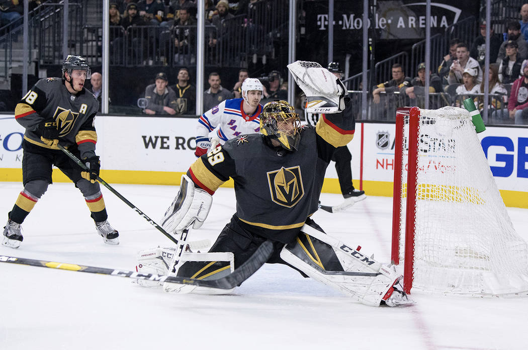 Vegas Golden Knights goalie Marc-Andre Fleury makes a save against the New York Rangers during the third period of an NHL hockey game Tuesday, Jan. 8, 2019, in Las Vegas. The Knights defeated the ...