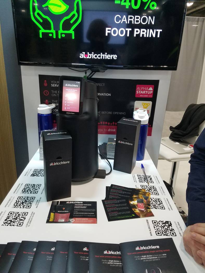 The Albicchiere Smart Wine Dispenser, shown at CES 2019, will serve any wine you put in it at t ...