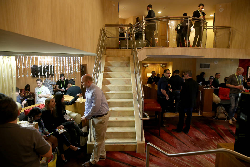 Conventioneers mingle during the Hardware Massive CES 2019 Happy Hour Bash at The Hangover Suite at Caesars Palace in Las Vegas Wednesday, Jan. 9, 2019. K.M. Cannon Las Vegas Review-Journal @KMCan ...