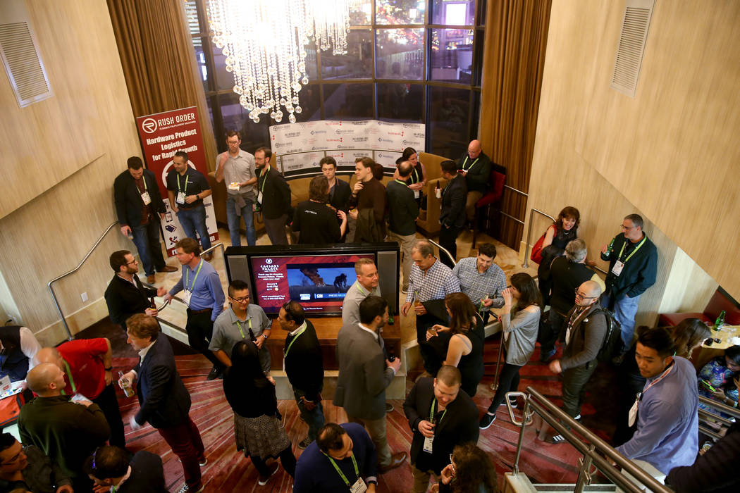 Conventioneers mingle during the Hardware Massive CES 2019 Happy Hour Bash at The Hangover Suite at Caesars Palace in Las Vegas Wednesday, Jan. 9, 2019. K.M. Cannon Las Vegas Review-Journal @KMCan ...