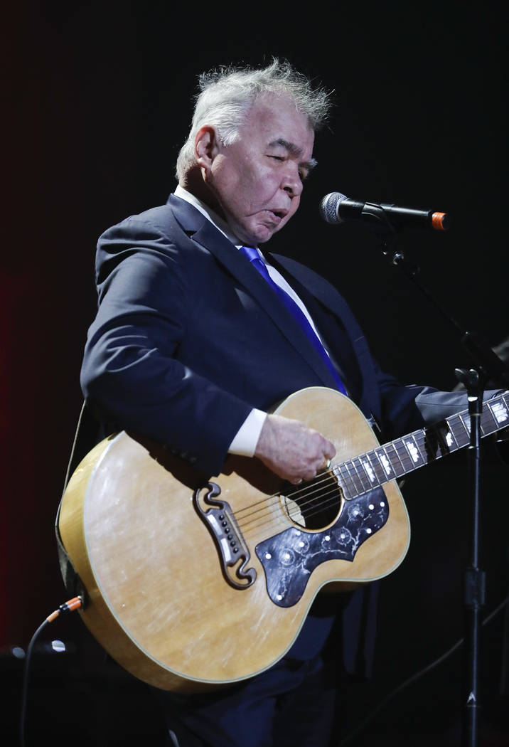 FILE - In this Wednesday, Sept. 13, 2017 file photo, John Prine performs during the Americana Honors and Awards show in Nashville, Tenn. Missy Elliott is making history as the first female rapper ...