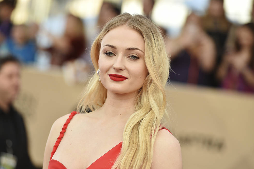 FILE - In this Jan. 29, 2017, file photo, Sophie Turner arrives at the 23rd annual Screen Actors Guild Awards at the Shrine Auditorium & Expo Hall in Los Angeles. HBO announced Sunday night, J ...