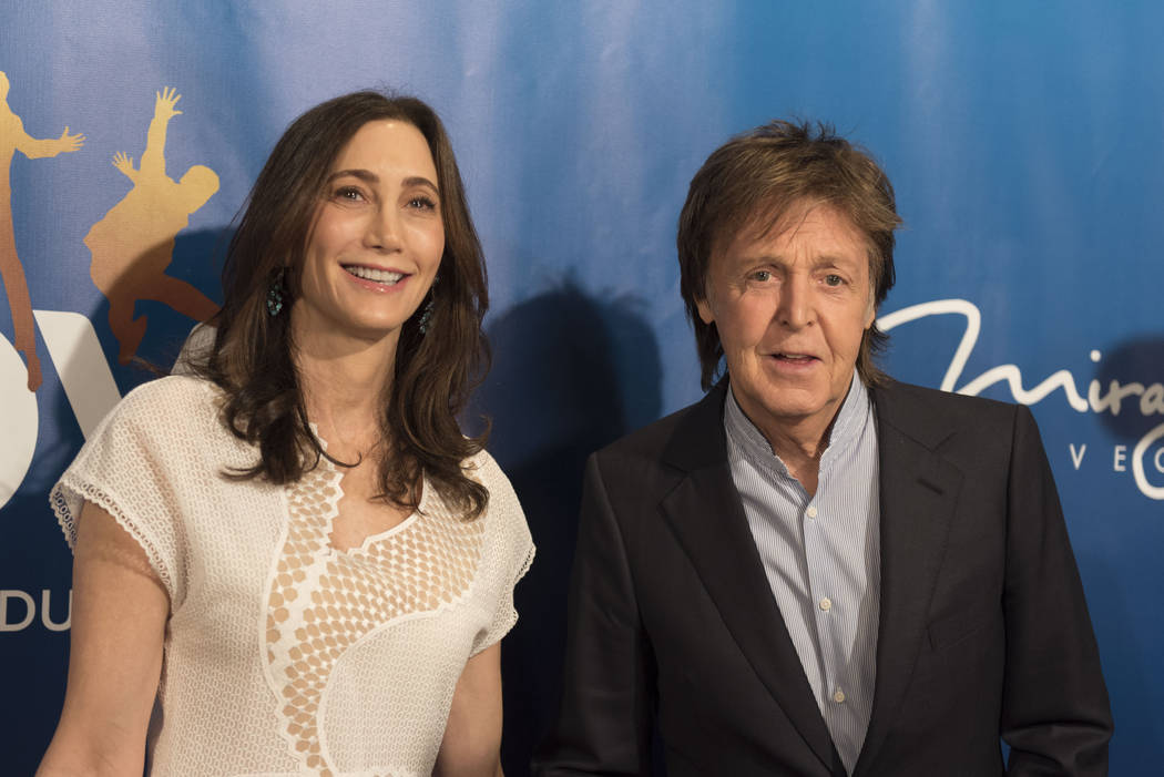 Paul McCartney and his wife, Nancy Shevell, pose during a red carpet event to celebrate the 10th anniversary of Cirque du Soleil's The Beatles LOVE at The Mirage in Las Vegas Thursday, July 14, 20 ...