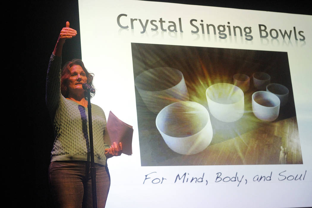 Diondra, performing arts center director at Summerlin Library, shares a few words at Crystal Singing Bowls, a free presentation in the library's theater on Saturday that included the detailed hist ...