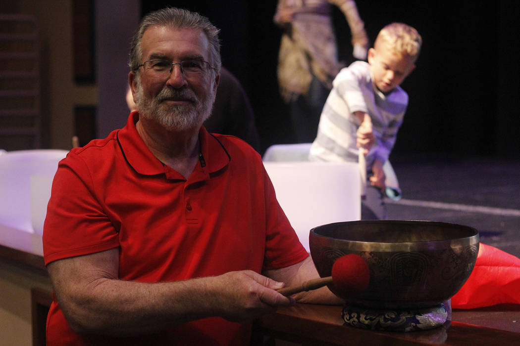Chuck Stinnett is pictured beside the singing bowl he bought in Nepal. The bowl is engraved with chants from monks in that area, he said. (Mia Sims/Las Vegas Review-Journal @miasims___)