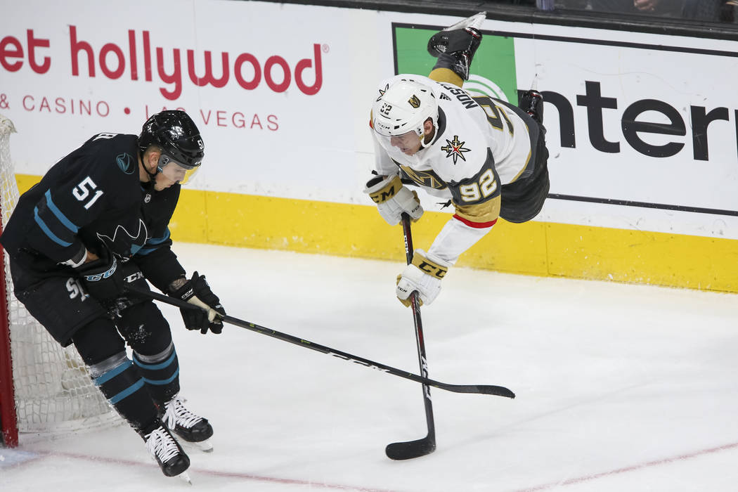 Vegas Golden Knights left wing Tomas Nosek (92) falls to the ice as he takes a shot past San Jose Sharks defenseman Radim Simek (51) during the second period of an NHL hockey game at T-Mobile Aren ...