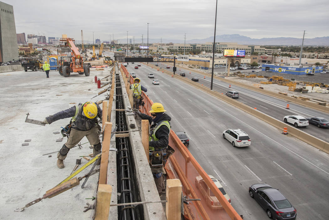 Construction continues on the HOV ramp in the Spaghetti Bowl as part of Project Neon on Wednesday, Dec. 5, 2018, in Las Vegas. (Benjamin Hager/Las Vegas Review-Journal)