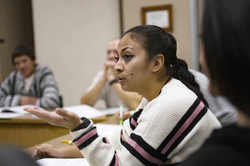 Inmate Yesenia La Rue asks a question during Moral Recognition Therapy class at Casa Grande, a transitional housing facility run by the Nevada Department of Corrections, in Las Vegas, Wednesday, J ...