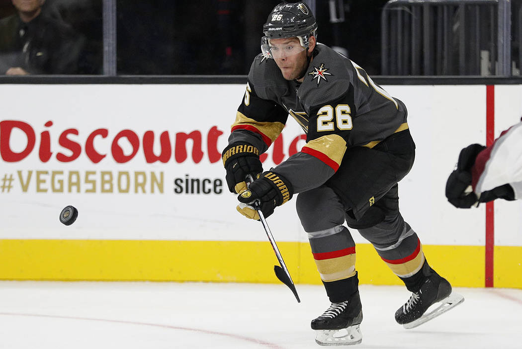 Vegas Golden Knights center Paul Stastny, seen in September, vies for the puck against the Colorado Avalanche during the third period of a preseason NHL hockey game in Las Vegas. (AP Photo/John Lo ...