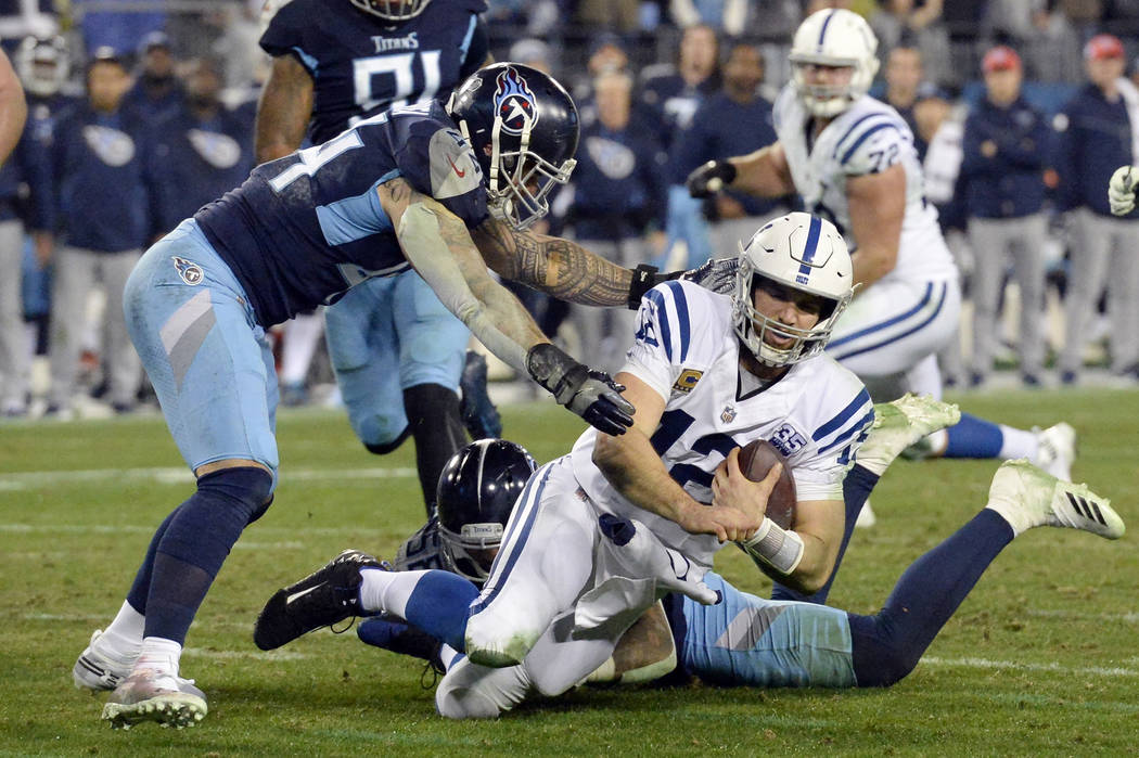 Indianapolis Colts quarterback Andrew Luck (12) is brought down as he scrambles against the Tennessee Titans in the second half of an NFL football game Sunday, Dec. 30, 2018, in Nashville, Tenn. ( ...