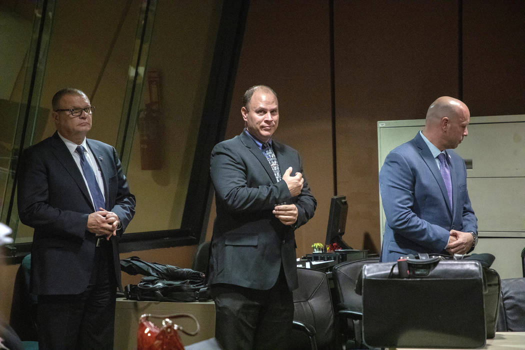 Former Detective David March, left, Chicago Police Officer Thomas Gaffney and former officer Joseph Walsh appear at a pre-trial hearing in Chicago, Oct. 30, 2018. The three Chicago police officers ...