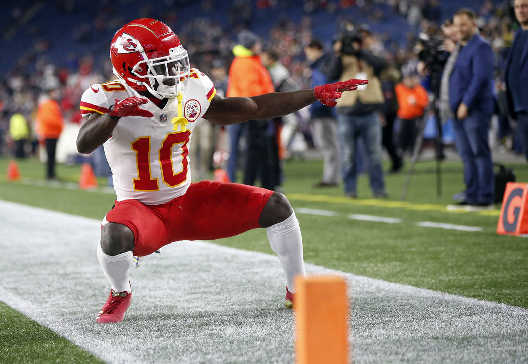 FILE - In this Sunday, Oct. 14, 2018, file photo, Kansas City Chiefs wide receiver Tyreek Hill strikes a pose as he warms up before an NFL football game against the New England Patriots in Foxboro ...