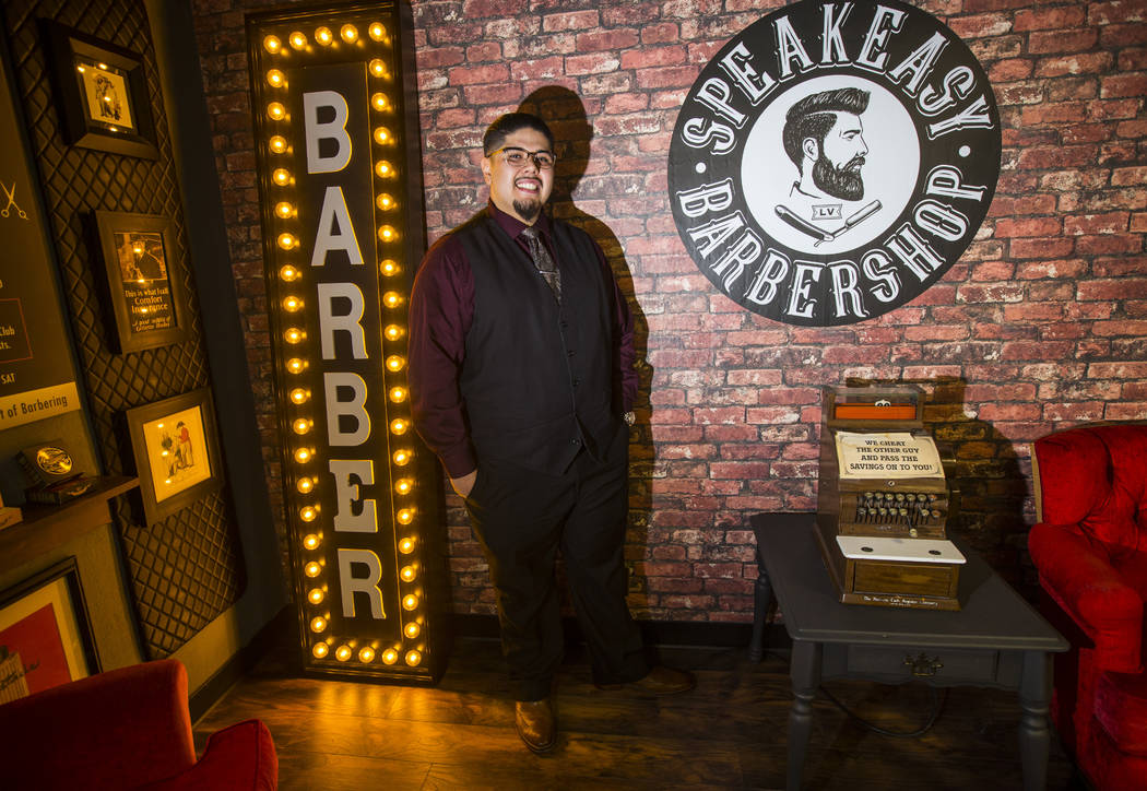 Speakeasy Barbershop owner Andres Dominguez poses for a portrait at his business at the El Cortez in downtown Las Vegas on Tuesday, Jan. 15, 2019. Dominguez's grandfather worked at the barbershop ...