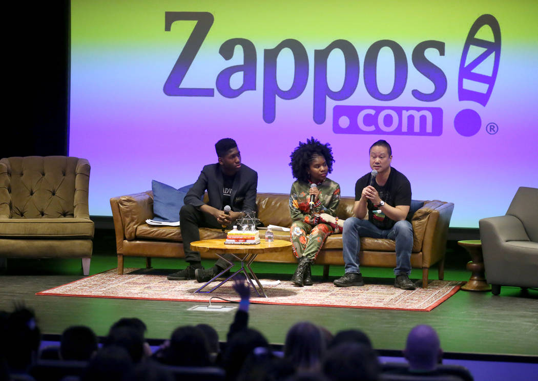 Zappos CEO Tony Hsieh, right, takes questions with Meahel Heard-Pitra, left, and Trinitee Stokes during the first Dr. Martin Luther King Jr. Technology Summit at Zappos headquarters in downtown La ...